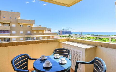 Oropesa del Mar 630: Sky, Furniture, Table, Property, Chair, Azure, Building, Lighting, Outdoor Furniture, Interior Design