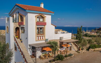 Agia Pelagia 2: Snow, Sky, Mountain, Window, Cloud, Building, House, Slope, Tree, Cottage