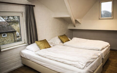 Bungalowpark Landsrade: Bedroom, Wall, Bed, Floor, Wood, Bedding, Flooring, Bed Sheet, Interior Design, Room