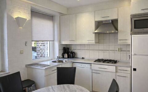 Bungalowpark Landsrade: Furniture, Kitchen, Countertop, Interior Design, Kitchen Appliance, Major Appliance, Flooring, Ceiling, Floor, Cabinetry