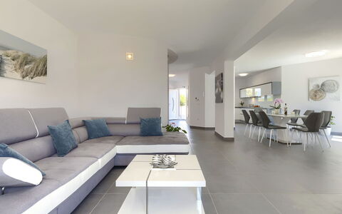 Villa Gocci: Table, Furniture, Couch, Picture Frame, Interior Design, Building, Flooring, Floor, Living Room
