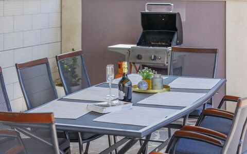 Villa Gocci: Table, Furniture, Property, Building, Bottle, Computer Desk, Chair, Interior Design