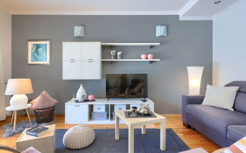 Tea: Furniture, Table, Couch, Azure, Comfort, Lighting, Living Room, Wood, Flooring, Floor