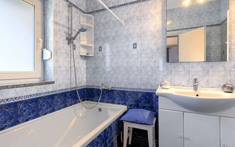 Tea: Plumbing Fixture, Property, Sink, Mirror, Tap, Bathtub, Building, Shower Head, Bathroom, Purple
