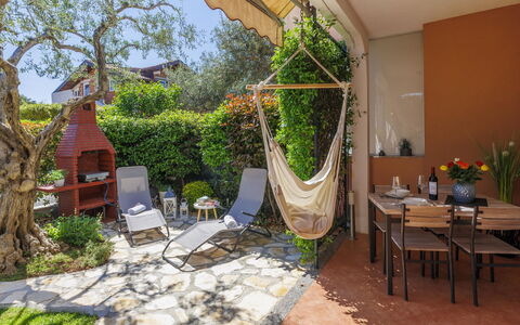 Tea: Plant, Furniture, Property, Building, Table, Interior Design, Tree, Sky, Shade, Chair