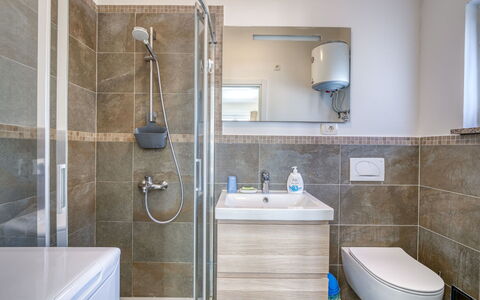 Silvana: Bathroom, Flooring, Plumbing Fixture, Interior Design, Floor, Sink, Tap, Bathroom Sink, Toilet, Bathroom Cabinet