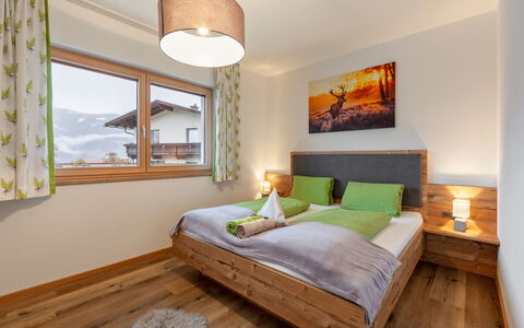 Birgit: Bedroom, Furniture, Room, Bed, Interior Design, Property, Wood Flooring, Ceiling, Bed Sheet, Wall