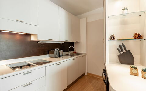 Porto Vecchio 150: Cabinetry, Furniture, Countertop, Building, Kitchen Stove, Drawer, Wood, Sink, Kitchen, Flooring