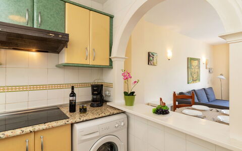 Torremolinos 25: Property, Room, Kitchen, Green, Countertop, Interior Design, Furniture, Cabinetry, Building, House