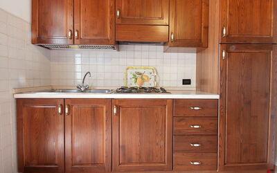Stregaia 819.1: Cabinetry, Furniture, Countertop, Room, Kitchen, Property, Cupboard, Sink, Drawer, Wood Stain
