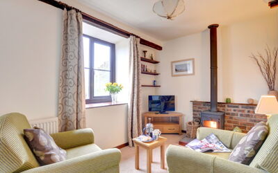 Llanerchymedd 608.5: Property, Furniture, Couch, Plant, Window, Table, Interior Design, Shade, Living Room