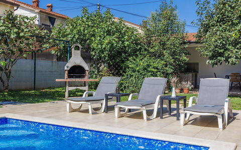 Villa Toni: Water, Plant, Furniture, Property, Sky, Azure, Swimming Pool, Outdoor Furniture, Shade, Chair