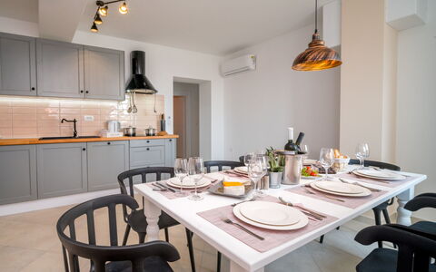 Amberg: Furniture, Table, Property, Cabinetry, Chair, Countertop, Tableware, Kitchen, Lighting, Interior Design