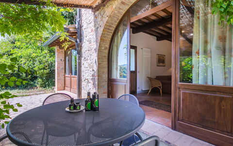 Podere S Giovanni: Table, Furniture, Property, Chair, Building, Wood, Interior Design, Shade, Door, Wall