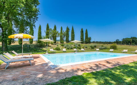 Podere S Giovanni: Water, Plant, Sky, Swimming Pool, Tree, Umbrella, Building, Shade, Outdoor Furniture, Natural Landscape