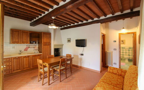 Borgo di Usciano: Flooring, Interior Design, Wood, Ceiling, Furniture, Floor, Room, Countertop, Cabinetry, Kitchen