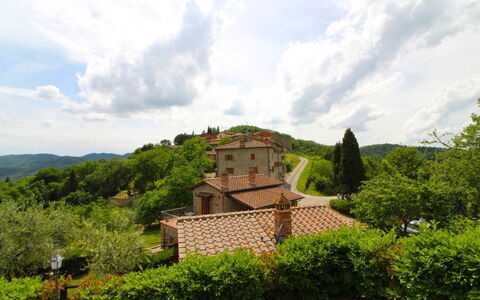 Borgo di Usciano: Cloud, Sky, Plant, Building, Tree, Natural Landscape, Highland, Land Lot, House, Window