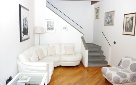 Gli Artisti: Furniture, Room, Property, Living Room, Stairs, Floor, Interior Design, Couch, Sofa Bed, Building