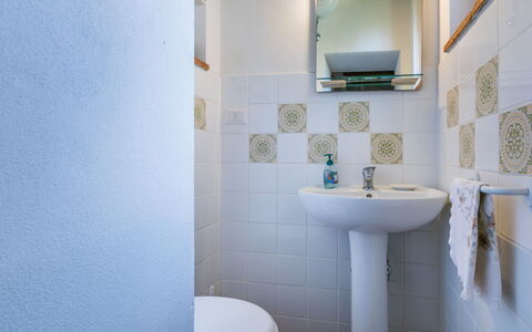 La Terrazza: Bathroom, Plumbing Fixture, Flooring, Floor, Interior Design, Bathroom Sink, Plumbing, Toilet, Tile, Toilet Seat