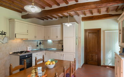 Casale Il Giglio 880.2: Cabinetry, Property, Furniture, Table, Countertop, Wood, Lighting, Interior Design, Chair, Kitchen