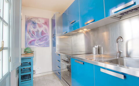 Suite 48: Room, Property, Blue, Countertop, Turquoise, Cabinetry, Kitchen, Interior Design, Furniture, Building
