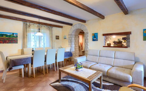 Villa Prisedi: Table, Furniture, Picture Frame, Property, Couch, Azure, Living Room, Houseplant, Lighting, Interior Design
