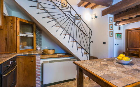 Casale Fonte: Furniture, Cabinetry, Table, Building, Wood, Kitchen, Interior Design, Flooring, Floor, Wood Stain