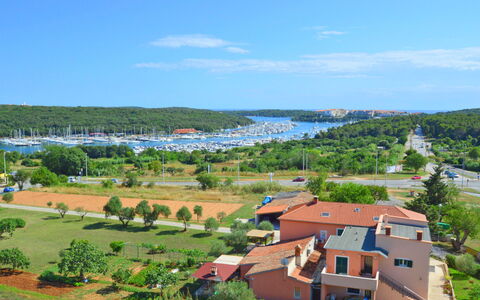 Adriana: Residential Area, Village, Natural Landscape, Property, Town, Human Settlement, Sky, Neighbourhood, Rural Area, Suburb