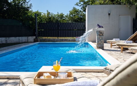 Labin: Water, Property, Sky, Swimming Pool, Plant, Azure, Outdoor Furniture, Tree, Rectangle, Building