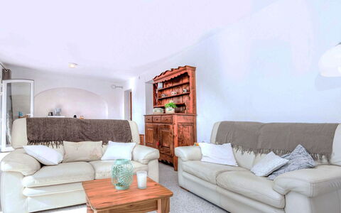 La Teulada: Furniture, Couch, Interior Design, Wood, Flooring, Room, Floor, Living Room, Home, Lighting