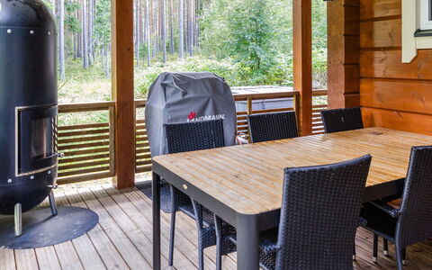 Villa Utu: Furniture, Chair, Outdoor Furniture, Table, Wood, Outdoor Table, Kitchen & Dining Room Table, Shade, Garden, Umbrella