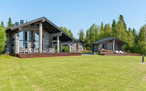 Villa Pärla: Furniture, Chair, Outdoor Furniture, Table, Wood, Outdoor Table, Kitchen & Dining Room Table, Shade, Garden, Umbrella