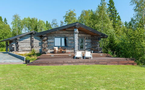 Villa Pärla: Furniture, Chair, Outdoor Furniture, Table, Wood, Outdoor Table, Kitchen & Dining Room Table, Shade, Garden, Umbrella