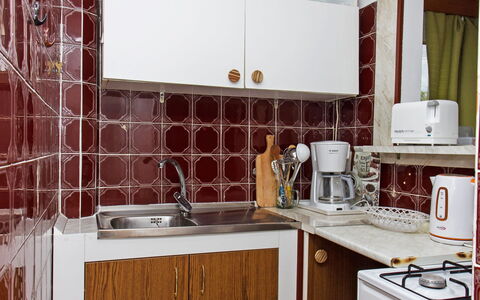 Michael: Cabinetry, Countertop, Kitchen Sink, Tap, Property, Sink, Furniture, Plumbing Fixture, Kitchen Stove, Building