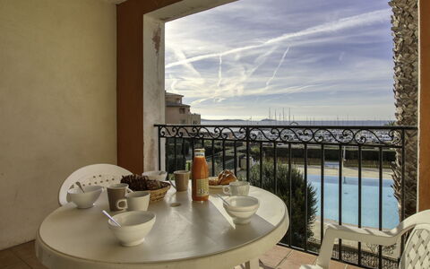 Six Fours la Coudoulière 101: Table, Furniture, Building, Property, Chair, Sky, Dishware, Tableware, Azure, Window