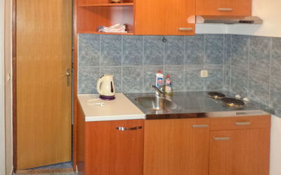 Žile 140.2: Cabinetry, Countertop, Furniture, Property, Room, Kitchen, Cupboard, Plywood, Wood Stain, Material Property