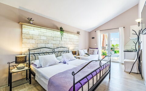 Villa Mutnik: Furniture, Interior Design, Bed, Flooring, Floor, Bedroom, Home, Apartment, Pillow, Resort