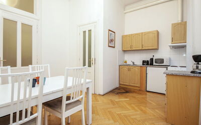 St. Giles 71.2: Room, Furniture, Property, Floor, Building, Interior Design, Kitchen, Wood Flooring, Cabinetry, Yellow