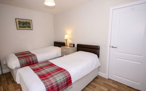 Devonvale Place: Furniture, Property, Comfort, Building, Wood, Lighting, Interior Design, Pillow, Bed Frame, Drawer