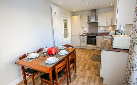 Devonvale Place: Furniture, Property, Cabinetry, Table, Countertop, Wood, Chair, Interior Design, Flooring, Floor