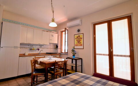 Gondar Studio: Table, Property, Furniture, Window, Chair, Wood, Interior Design, Houseplant, Shade