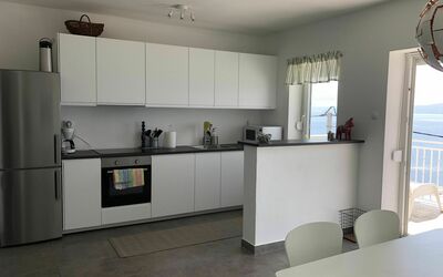 Villa Gustav - Upper Apartment: Room, Property, Furniture, Kitchen, Countertop, Interior Design, Cabinetry, Floor, Building, House