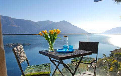 Cà dal Non: Furniture, Table, Property, Vacation, Sky, Balcony, House, Folding Chair, Room, Azure