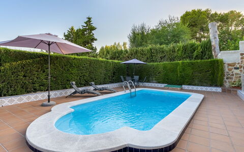 Villa San Vicente: Water, Plant, Sky, Property, Swimming Pool, Azure, Tree, Outdoor Furniture, Shade, Building