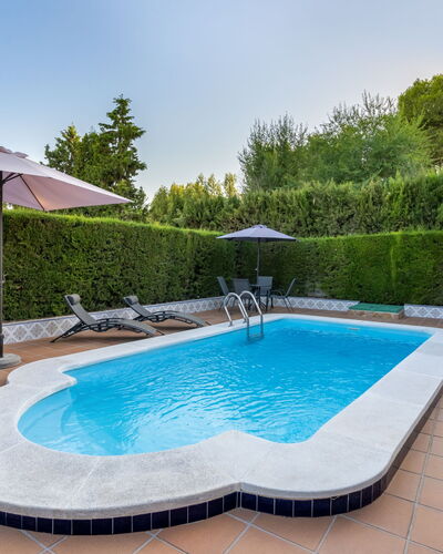 Villa San Vicente: Water, Plant, Sky, Property, Swimming Pool, Azure, Tree, Outdoor Furniture, Shade, Building