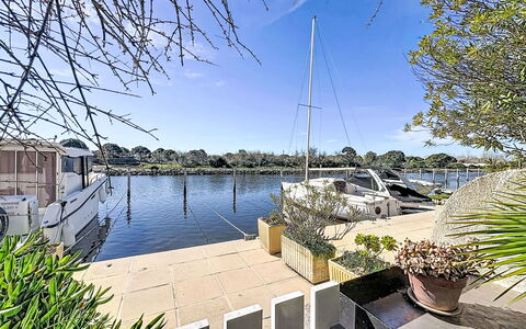 Marinas Beach: Water, Boat, Marina, Watercraft, Waterway, Dock, Reflection, Channel, Lake, Port