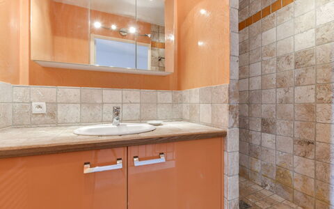 Marinas Beach: Property, Room, Bathroom, Tile, Orange, Architecture, Interior Design, Wall, Furniture, Sink