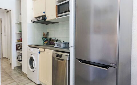 La Marina: Kitchen Appliance, Major Appliance, Washing Machine, Kitchen, Home Appliance, Interior Design, Flooring, Countertop, Furniture, Room