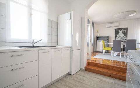 My Day House: Cabinetry, Countertop, Furniture, Wood, Kitchen, Flooring, Window, Floor, Drawer
