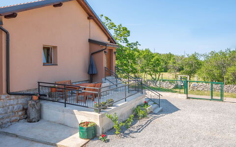 Marijana: Sky, Plant, Building, Property, Window, Land Lot, Shade, Tree, House, Road Surface